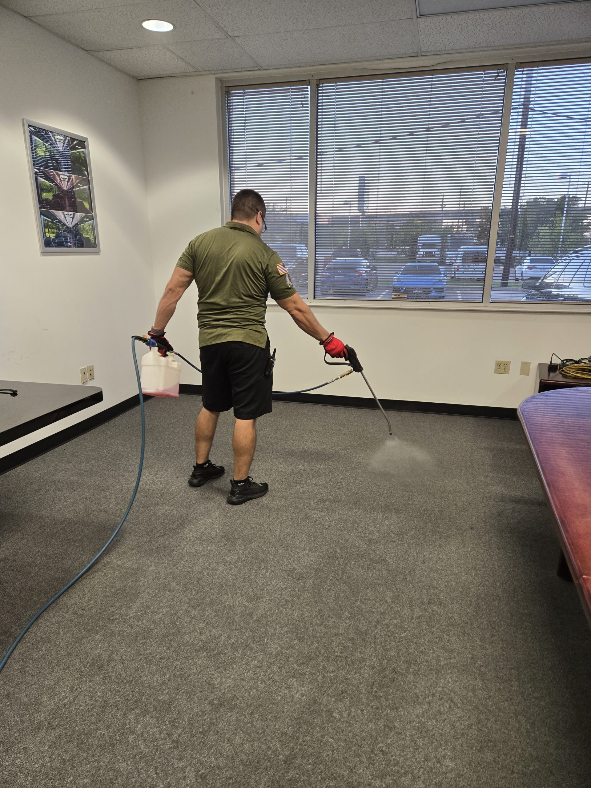 Technician performing source cleaning for Dallas odor removal