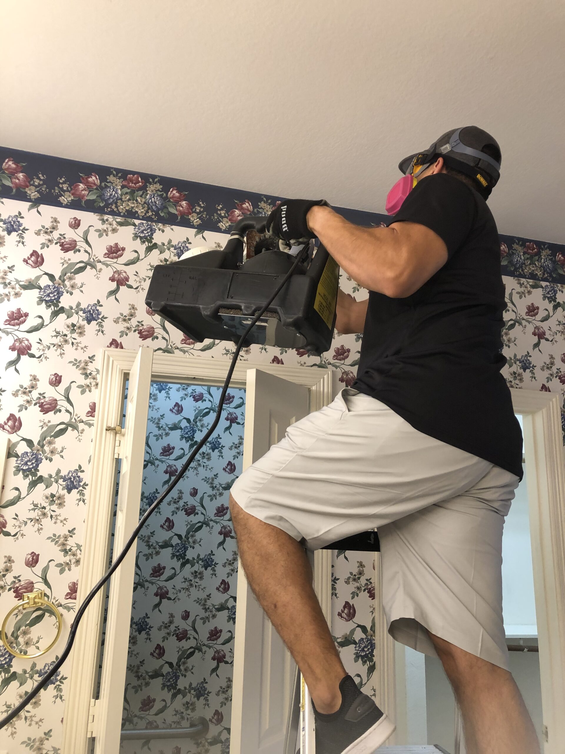 HEPA air filtration device used during cleaning