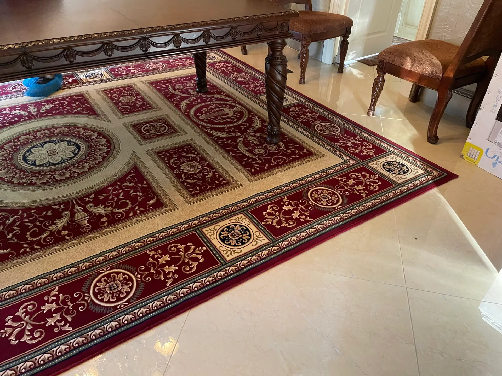 Dallas area rug cleaning technician inspecting rug before service