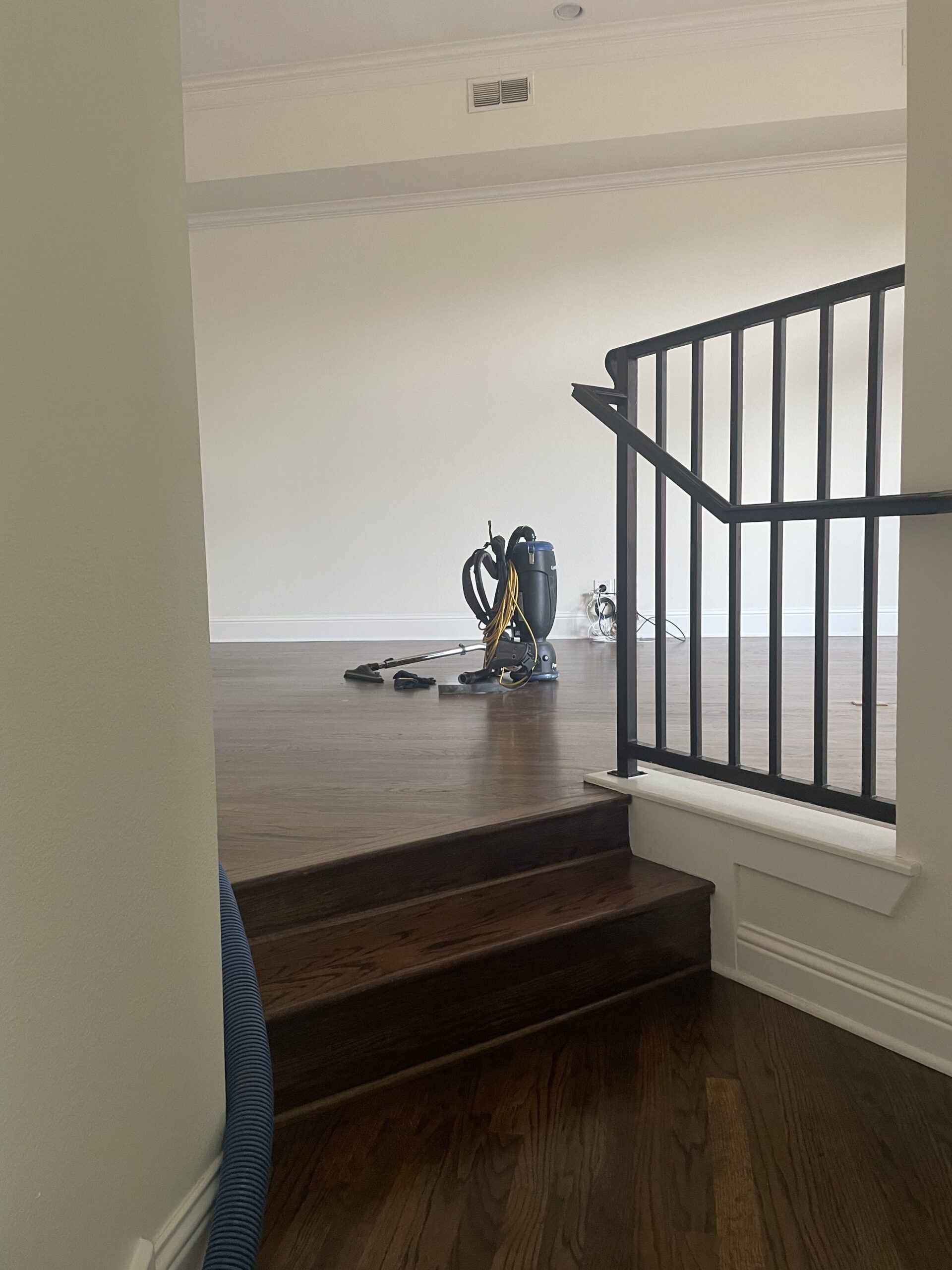 HEPA pre-vacuuming wood floors before cleaning